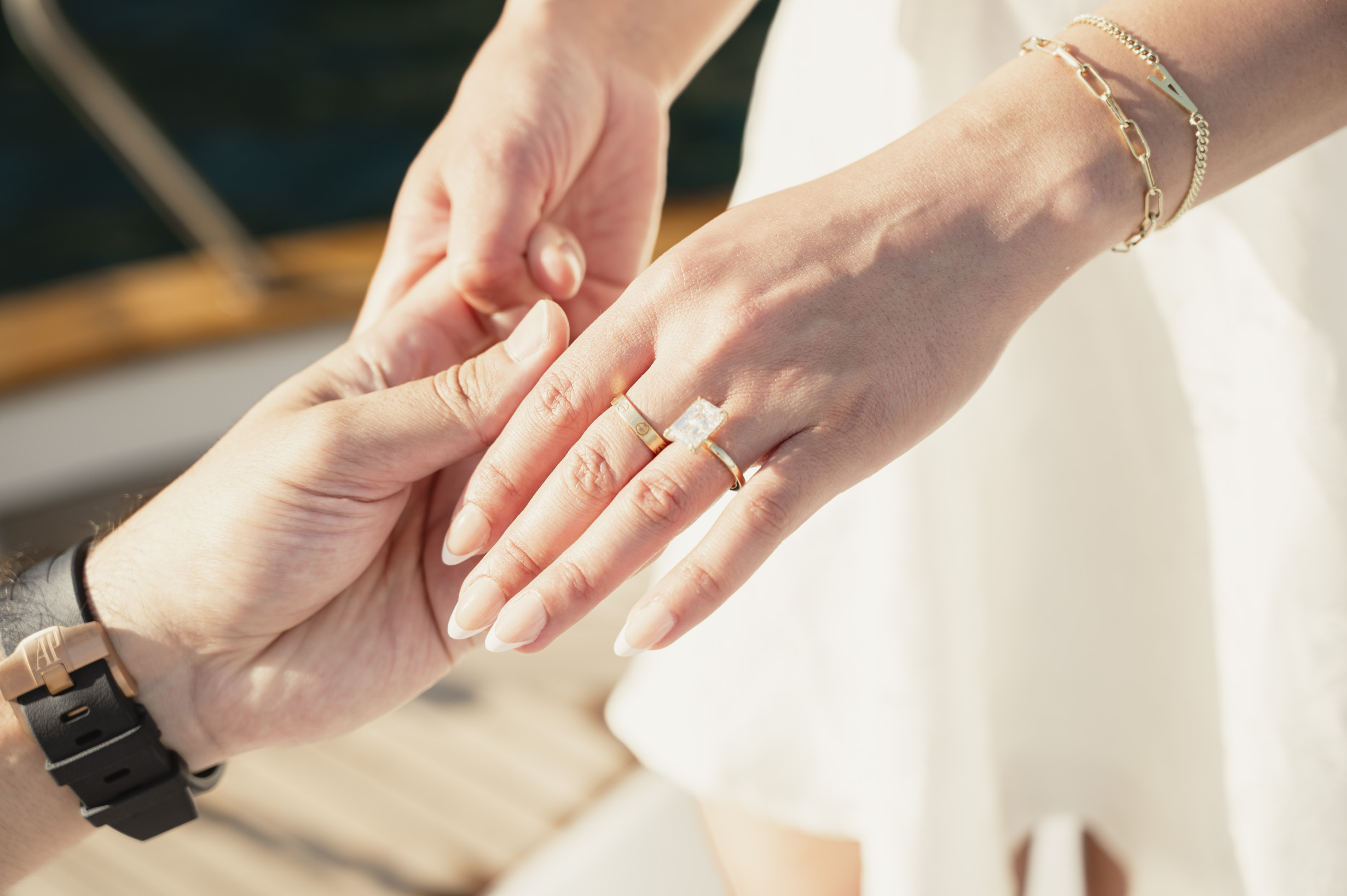 A close-up of Ayda’s engagement ring as the couple hold hands